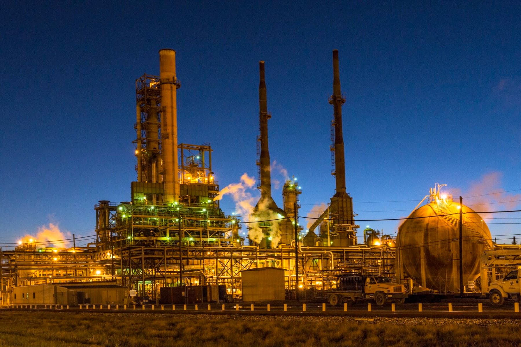 Valero's refinery in Port Arthur, Texas, lit up at dusk